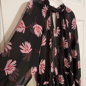 Express floral long sleeve peplum shape top Size L